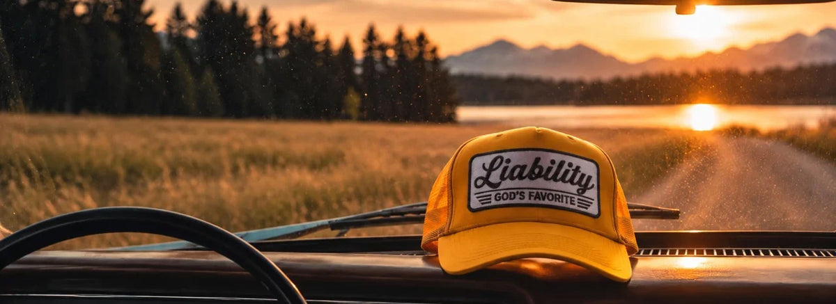 Friends wearing Identity Badge trucker hats beside a vintage pickup